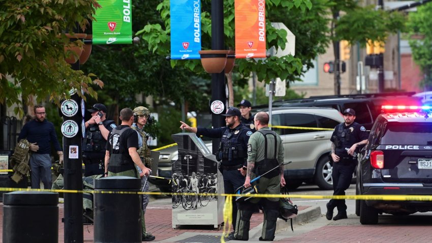 Police and FBI agents gather, after an attack that injured multiple people, in Boulder, Colorado, U.S. June 1, 2025.