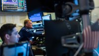 Traders work at the New York Stock Exchange on June 13, 2025.