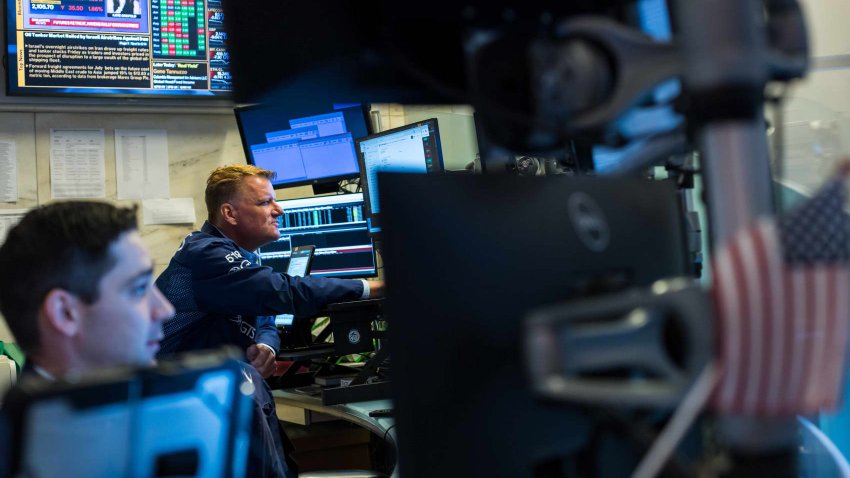 Traders work at the New York Stock Exchange on June 13, 2025.