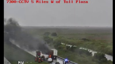 RAW: Semi-truck goes up in flames after crashing on Alligator Alley in Broward County