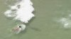 Shark spotted swimming near people at Fort Lauderdale Beach