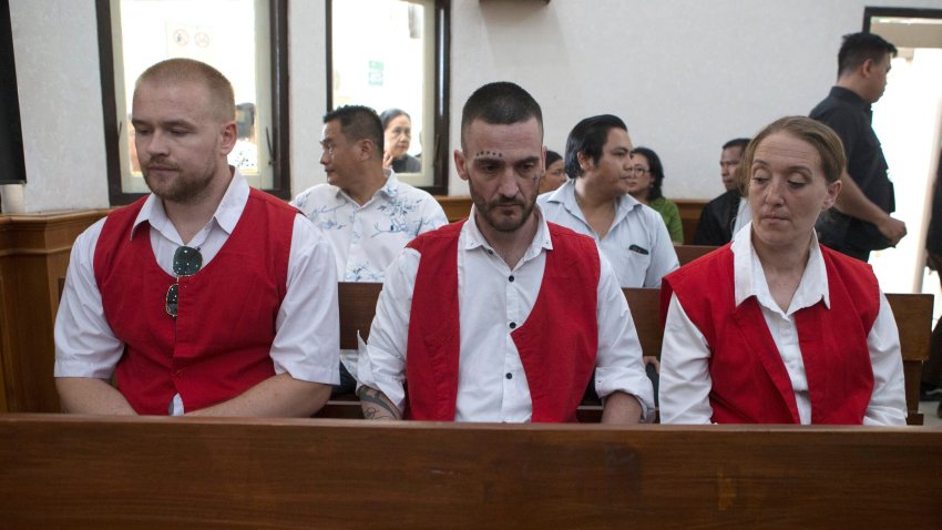 British nationals, from left, Phineas Float, Jonathan Collyer, and Lisa Stocker who are accused of smuggling nearly a kilogram (over two pounds) of cocaine into Indonesia sit inside the courtroom before the start of their trial hearing at Denpasar District Court in Denpasar, Bali, on Tuesday, June 3, 2025. (AP Photo/Firdia Lisnawati)