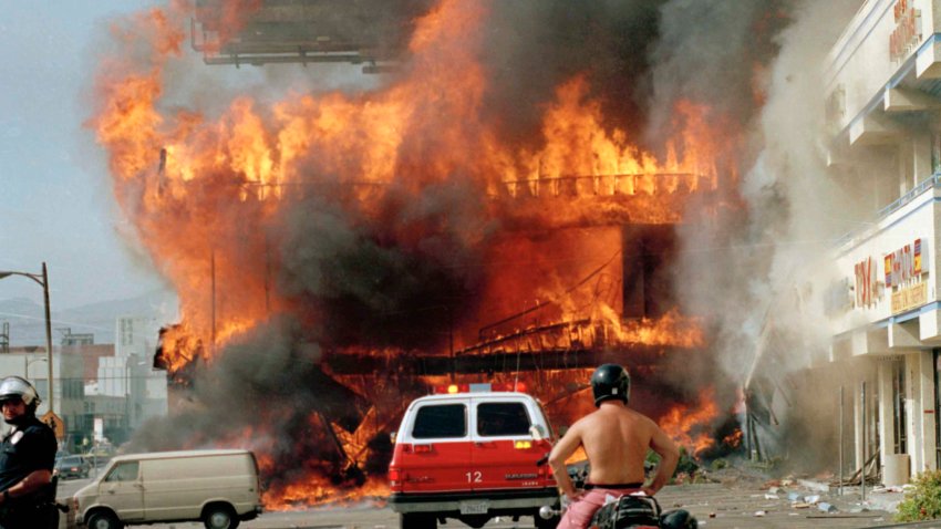 A Korean shopping mall burns during the Rodney King riots
