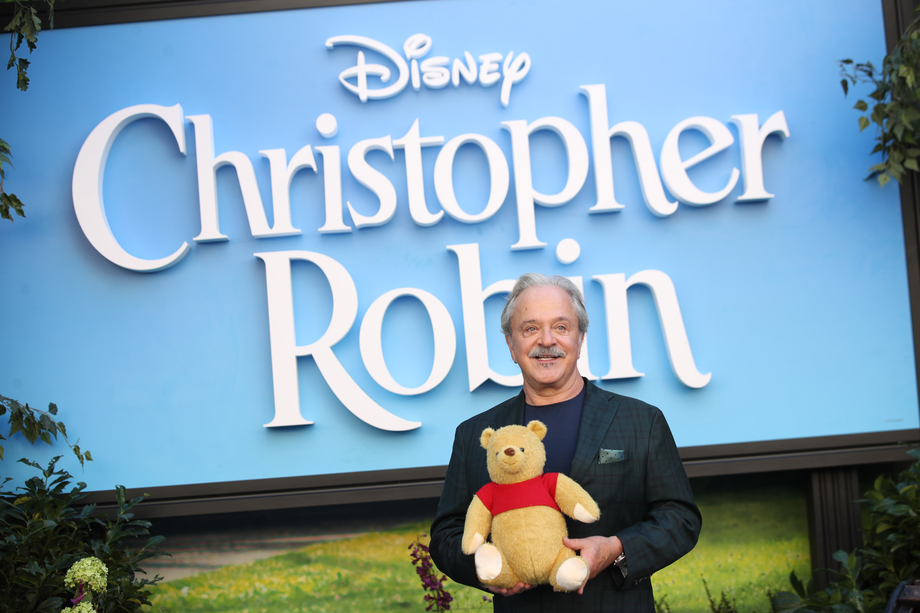 Winnie the Pooh is a grandpa! See the voice actor soothe his infant grandson in viral video