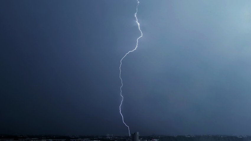 File. Lightning strike over a city