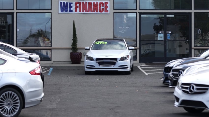 RICHMOND, CALIFORNIA – SEPTEMBER 06: A “We Finance” sign is posted at YG Auto Sales on September 06, 2023 in Richmond, California. Credit monitoring agencies are seeing a rise in defaults of credit card and auto loan payments as inflation continues to squeeze the pocketbooks of many Americans. According to credit agency Equifax, credit card delinquencies are at 3.8% default rate and car loans are at 3.6%. (Photo by Justin Sullivan/Getty Images)