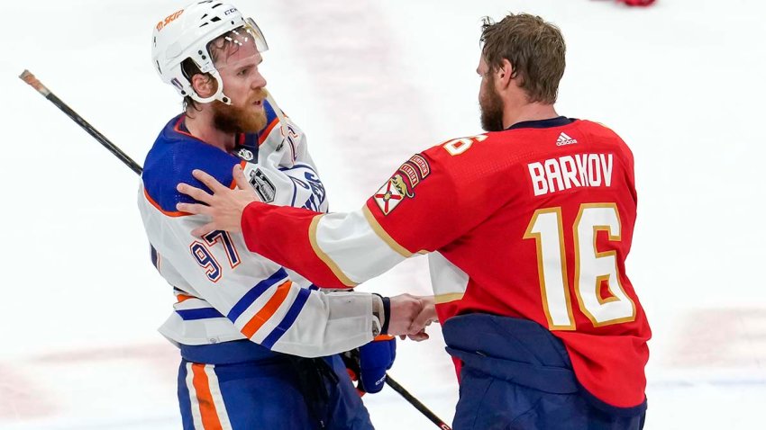 SUNRISE, FL – JUNE 24:  Edmonton Oilers center Connor McDavid (97) and Florida Panthers center Aleksander Barkov (16) meet for a hand shake at center ice during the NHL Stanley Cup Finals, Game 7 between the Florida Panthers and Edmonton Oilers on June 24th, 2024 at Amerant Bank Arena in Sunrise, FL. (Photo by Andrew Bershaw/Icon Sportswire via Getty Images)