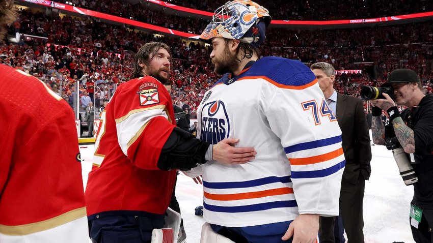 SUNRISE, FLORIDA – JUNE 24:  Stuart Skinner #74 of the Edmonton Oilers and Sergei Bobrovsky #72 of the Florida Panthers embrace after Florida’s 2-1 victory in Game Seven of the 2024 Stanley Cup Final at Amerant Bank Arena on June 24, 2024 in Sunrise, Florida. (Photo by Bruce Bennett/Getty Images)
