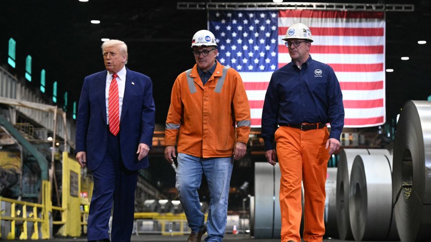 US President Donald Trump (L) tours US Steel – Irvin Works in West Mifflin, Pennsylvania, May 30, 2025, to mark the deal between Nippon Steel and US Steel.