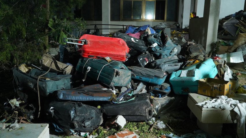 Luggage near the crash site of Air India Ltd. Flight 171 in Ahmedabad, Gujarat, India, on Thursday, June 12, 2025. An Air India Boeing Co. 787 aircraft traveling from Ahmedabad in India to London’s Gatwick airport crashed shortly after taking off, in what stands to be the most serious accident involving the US planemaker’s most advanced widebody airliner. Photographer: Siddharaj Solanki/Bloomberg