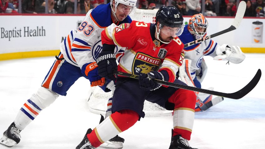 SUNRISE, FLORIDA – JUNE 09: Brad Marchand #63 of the Florida Panthers is pressured by Ryan Nugent-Hopkins #93 of the Edmonton Oilers during the second period of Game Three of the 2025 Stanley Cup Final between the Edmonton Oilers and the Florida Panthers at Amerant Bank Arena on June 09, 2025 in Sunrise, Florida.  (Photo by Brian Babineau/NHLI via Getty Images)