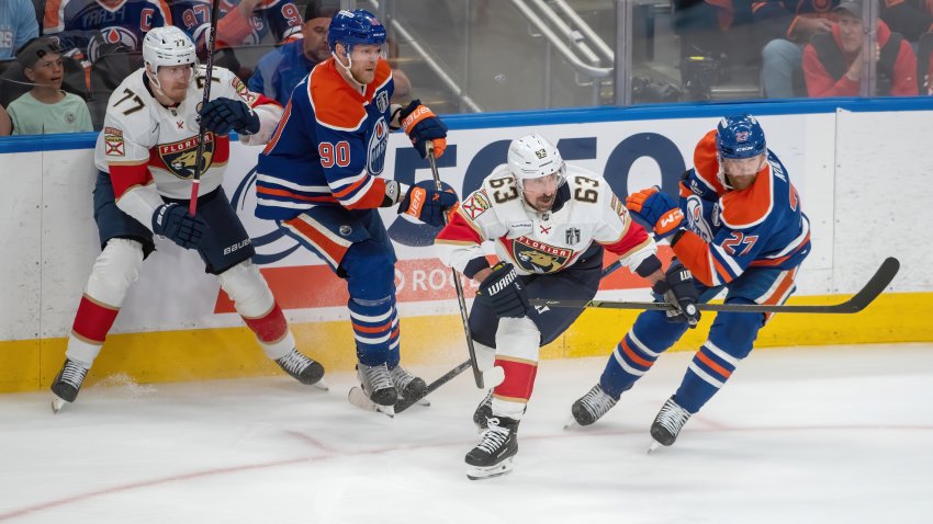 EDMONTON, CANADA – JUNE 14: Brad Marchand #63 and Niko Mikkola #77 of the Florida Panthers battle against Corey Perry #90 and Brett Kulak #27 of the Edmonton Oilers during the third period of Game Five of the 2025 Stanley Cup Final at Rogers Place on June 14, 2024 in Edmonton, Alberta, Canada.  (Photo by Leila Devlin/Getty Images)
