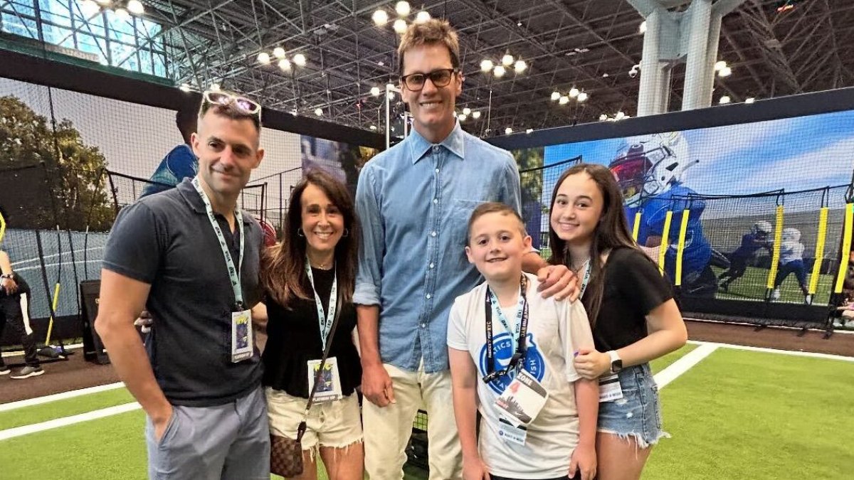 Wish granted! Make-A-Wish teen has a catch with Tom Brady at Fanatics Fest