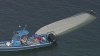 Boat overturns in water off Miami Beach