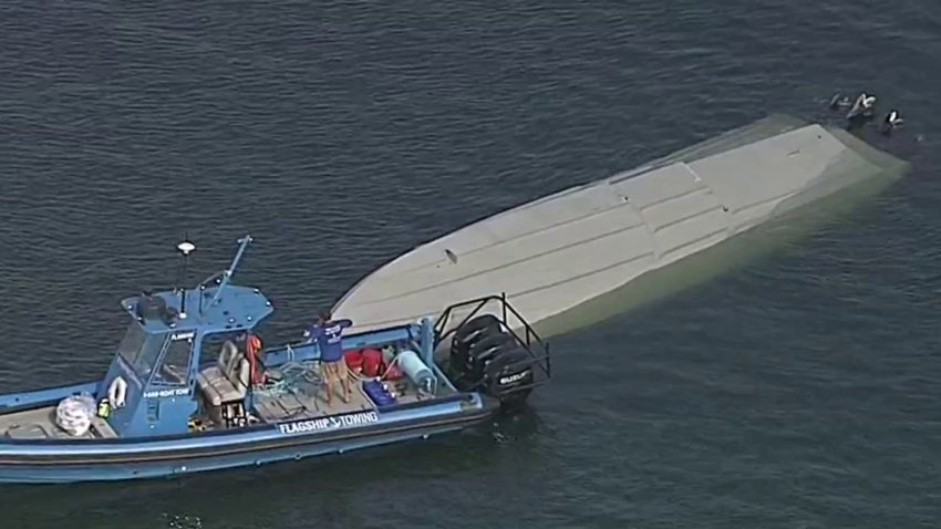 A boat has overturned in the water off Miami Beach on Thursday, June 12, 2025.