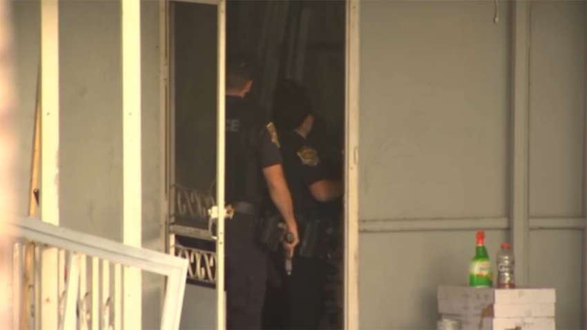 Police at the scene of a fatal double shooting in Davie in November 2022.