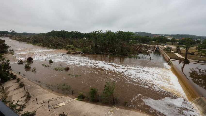 Widespread damage is visible in and around Kerrville, Texas, on July 6, 2025, following a deadly flash flood that causes the Guadalupe River to rise 26 feet in less than an hour early Friday morning. Eighty people are confirmed dead, and 40 more remain missing. Pictured: Days after the storm, the Guadalupe River still surges. Flattened trees are visible along its banks. (Photo by Reginald Mathalone/NurPhoto via Getty Images)