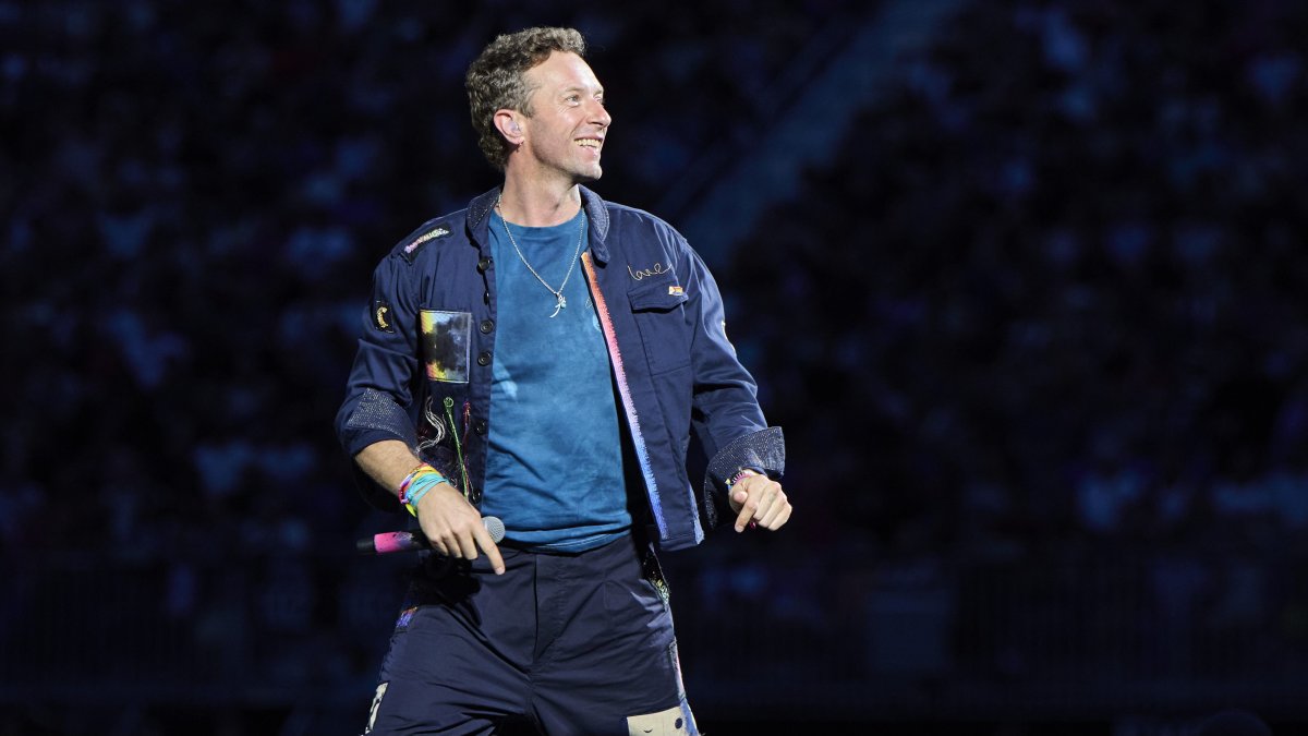 Company linked to couple canoodling at Coldplay concert says it's investigating incident