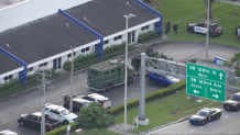 Armoved SWAT vehicles at the scene of a deputy shooting in southwest Miami-Dade on Nov. 7, 2025.