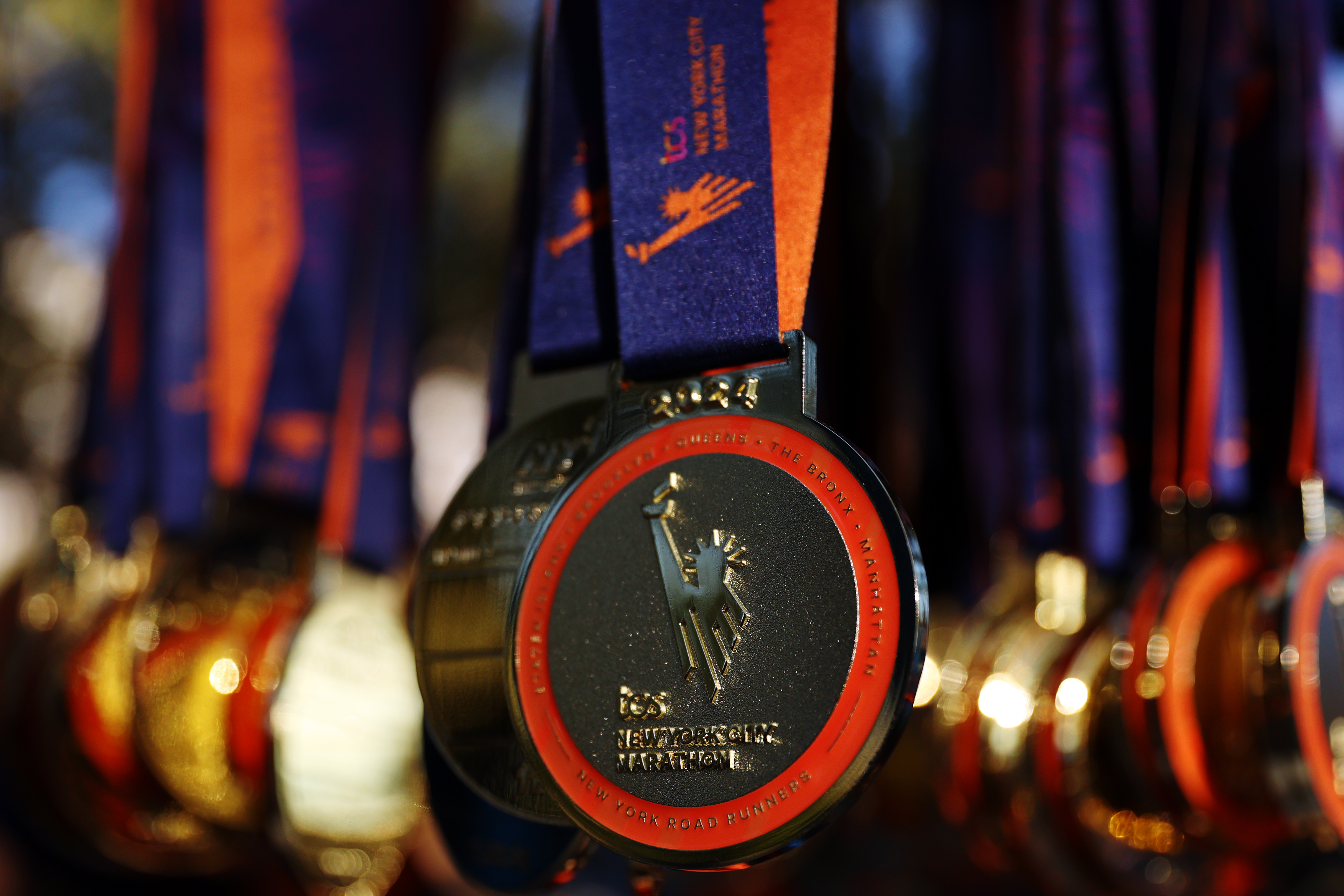 The hottest celebrity accessory this fall? A marathon medal