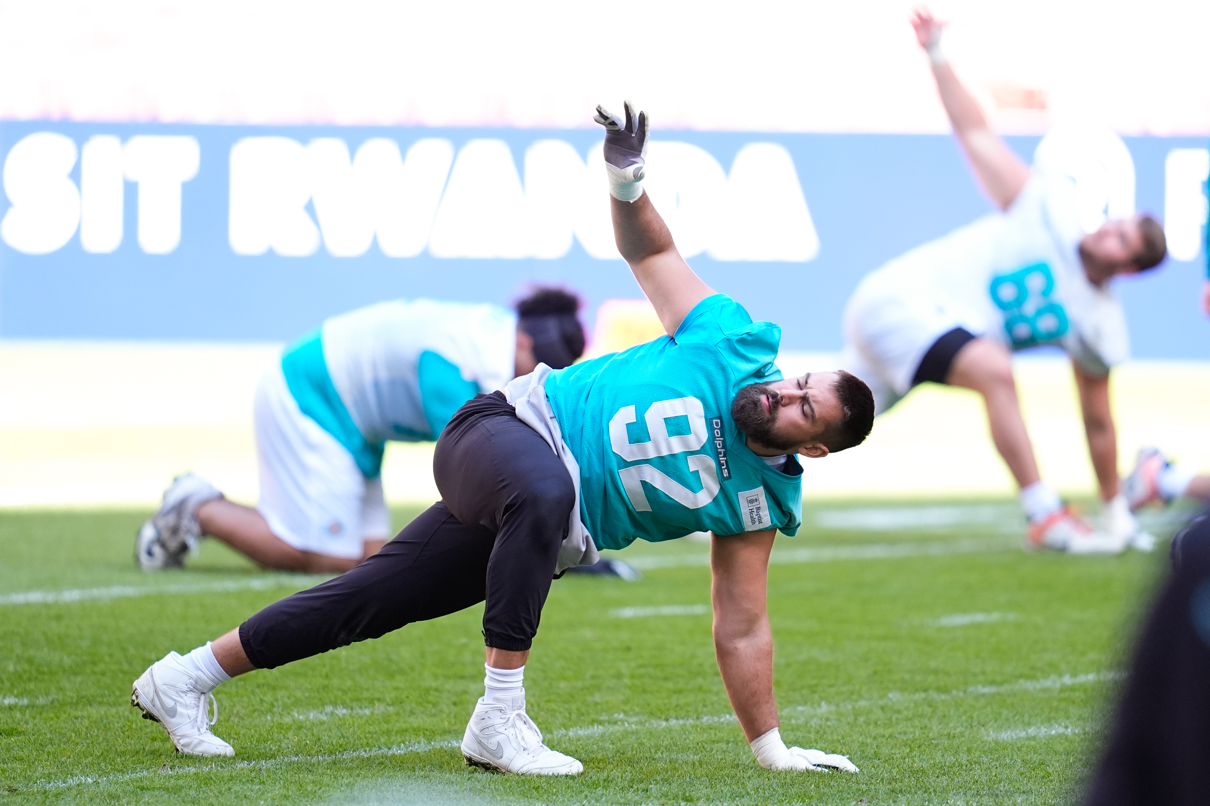 Dolphins and Commanders preparing for Madrid game on rival soccer grounds