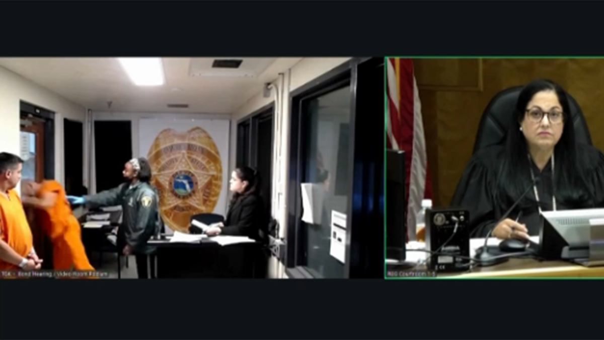 Video shows Miami-Dade inmate slam head into door during bond court appearance