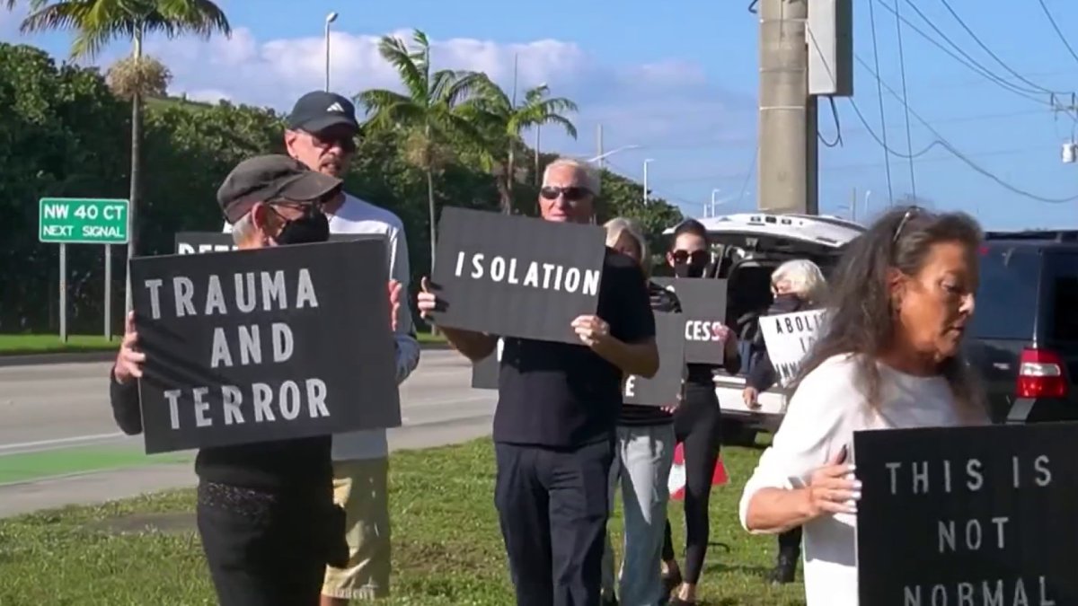 Protestors gather outside migrant detention center in Deerfield Beach on Christmas Day
