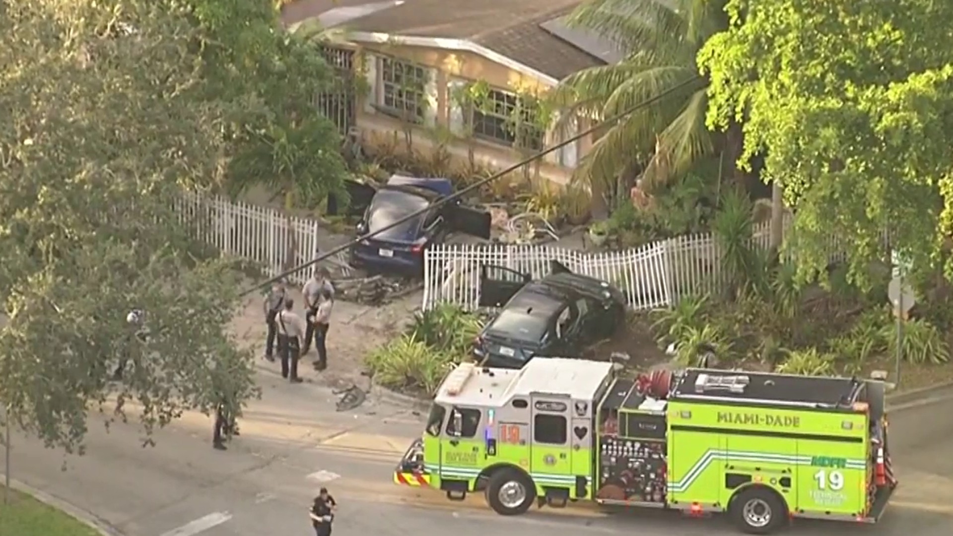 4 hospitalized after cars crash into front yard of North Miami
