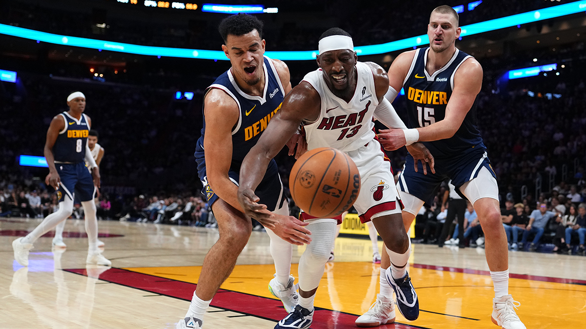 Jokic gets hurt late in 1st half, Heat pull away from there to top Nuggets 147-123