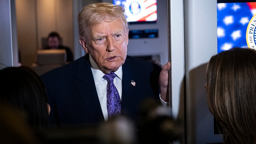 President Donald Trump speaks to the press aboard Air Force One en-route to Washington on Nov. 30, 2025.