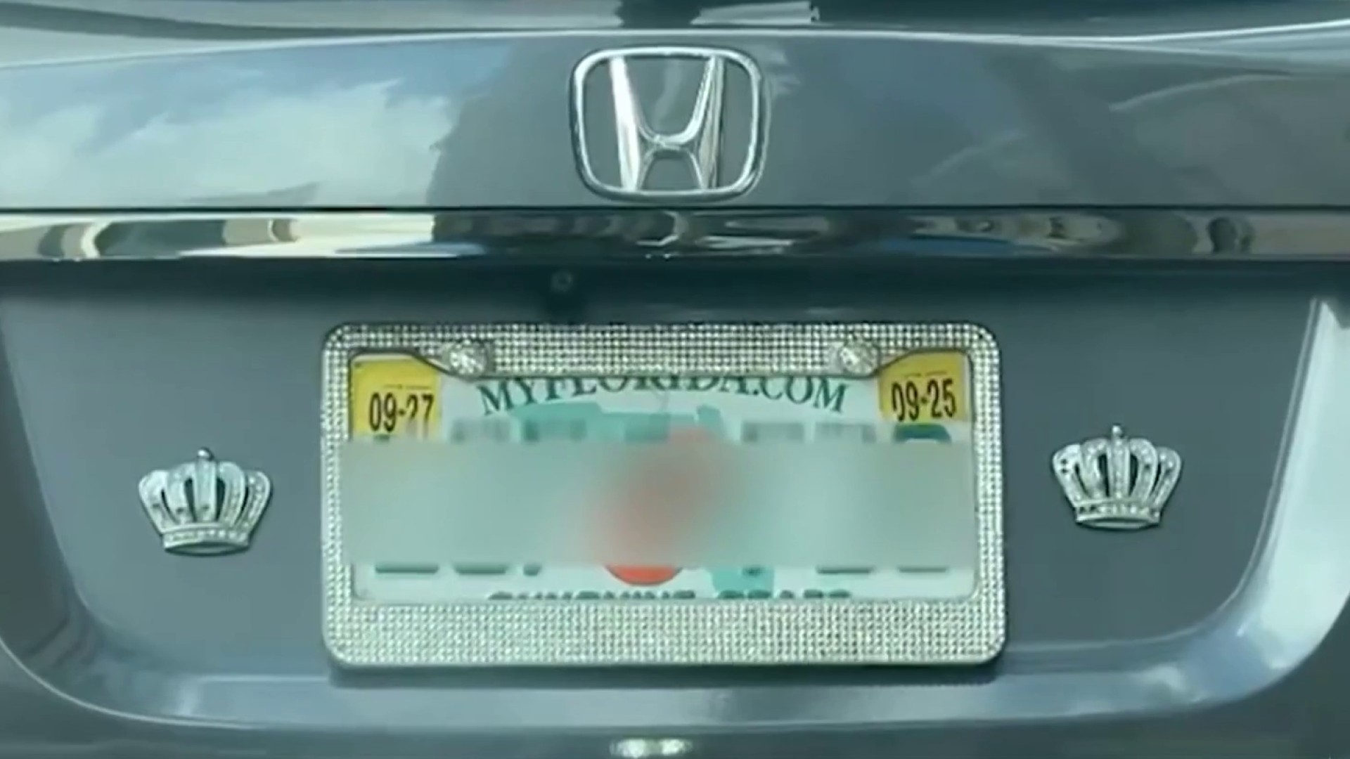 Florida clarifies new law on license plate frames
