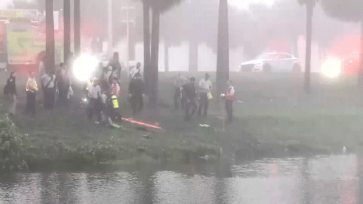 Person hospitalized after car crashes into canal in southwest Miami-Dade