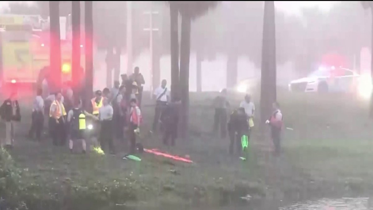 Person hospitalized after car crashes into canal in southwest Miami ...