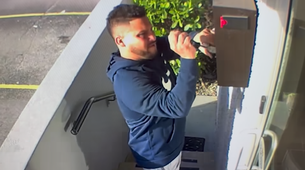 Caught on video: Police arrest two men accused of stealing mail in Medley