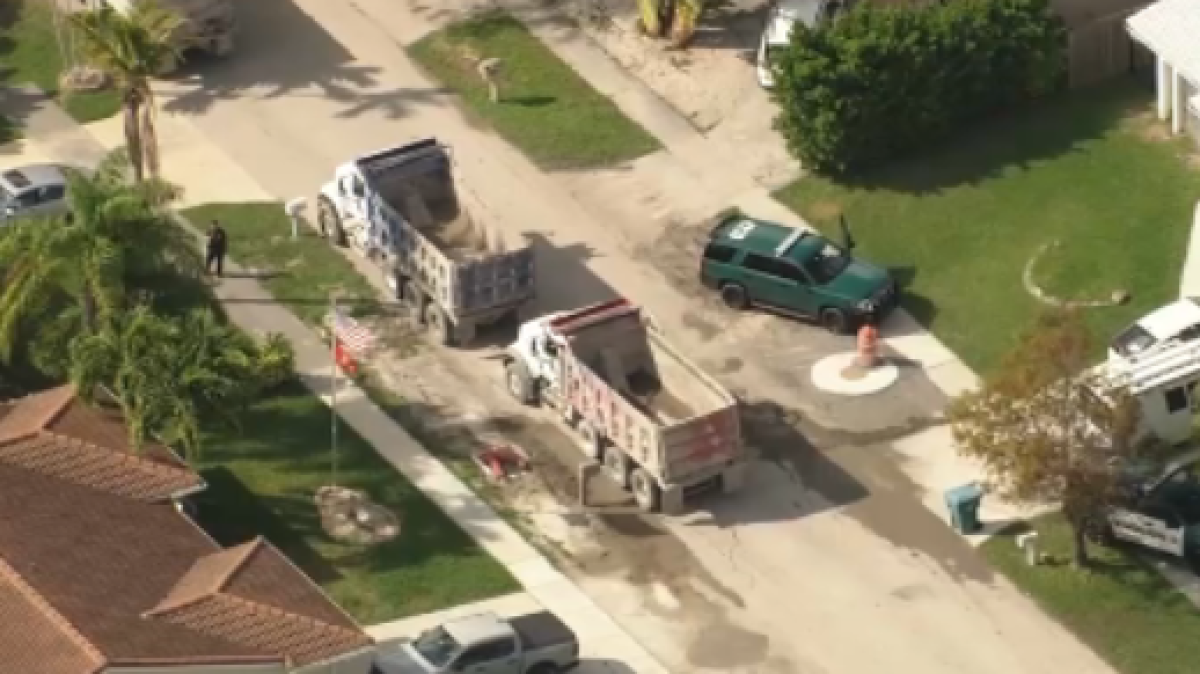 Construction worker hospitalized after being struck by dump truck in Dania Beach