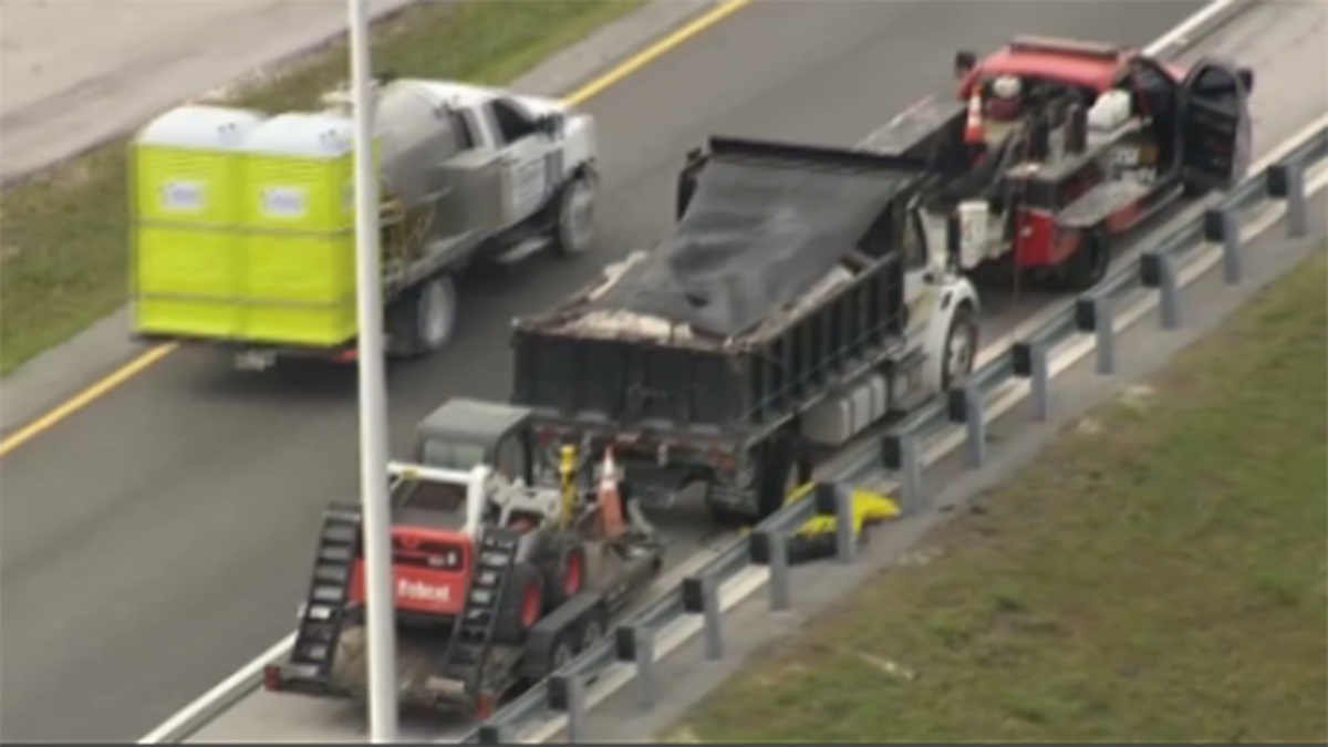Dump truck driver killed during flat tire repair on Dolphin Expressway: FHP