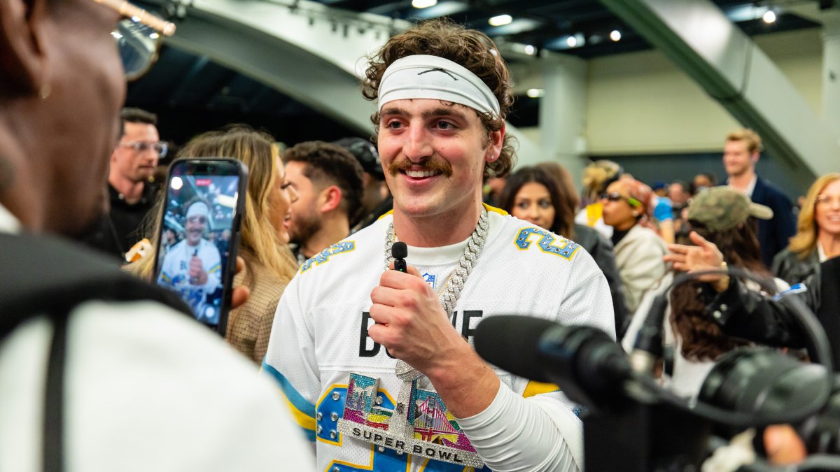 Benson Boone is the Seahawks' sideline photographer at Super Bowl 60