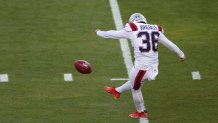 New England Patriots' kicker Andres Borregales delivers the opening kickoff