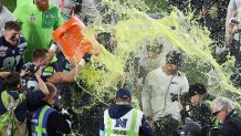 Head coach Mike MacDonald of the Seattle Seahawks is doused with Gatorade