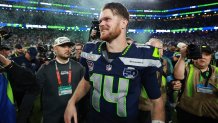 Seattle Seahawks quarterback Sam Darnold celebrates