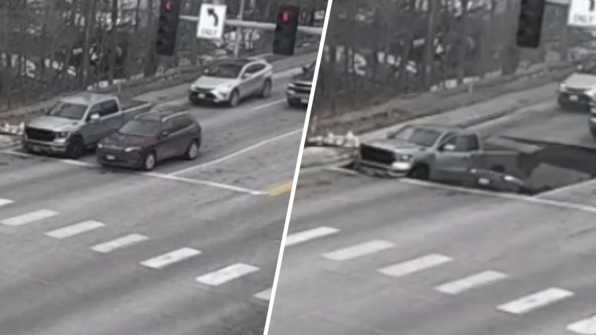 Video captures moment a sinkhole swallows vehicles at traffic light in Nebraska