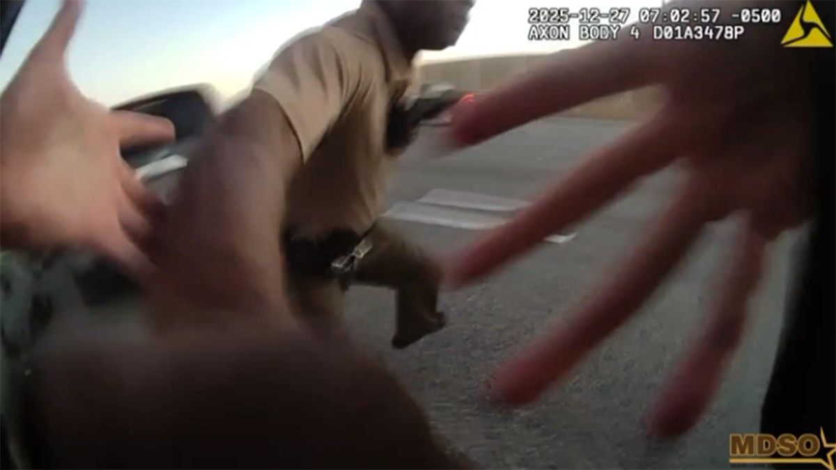 Miami-Dade deputy hit by car honored as video shows him pushing officer out of harm's way