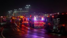 Firetrucks lineup outside LaGuardia Airport, Monday, March 23, 2026, in New York, after an Air Canada Jet collided with a Port Authority vehicle on a runway.