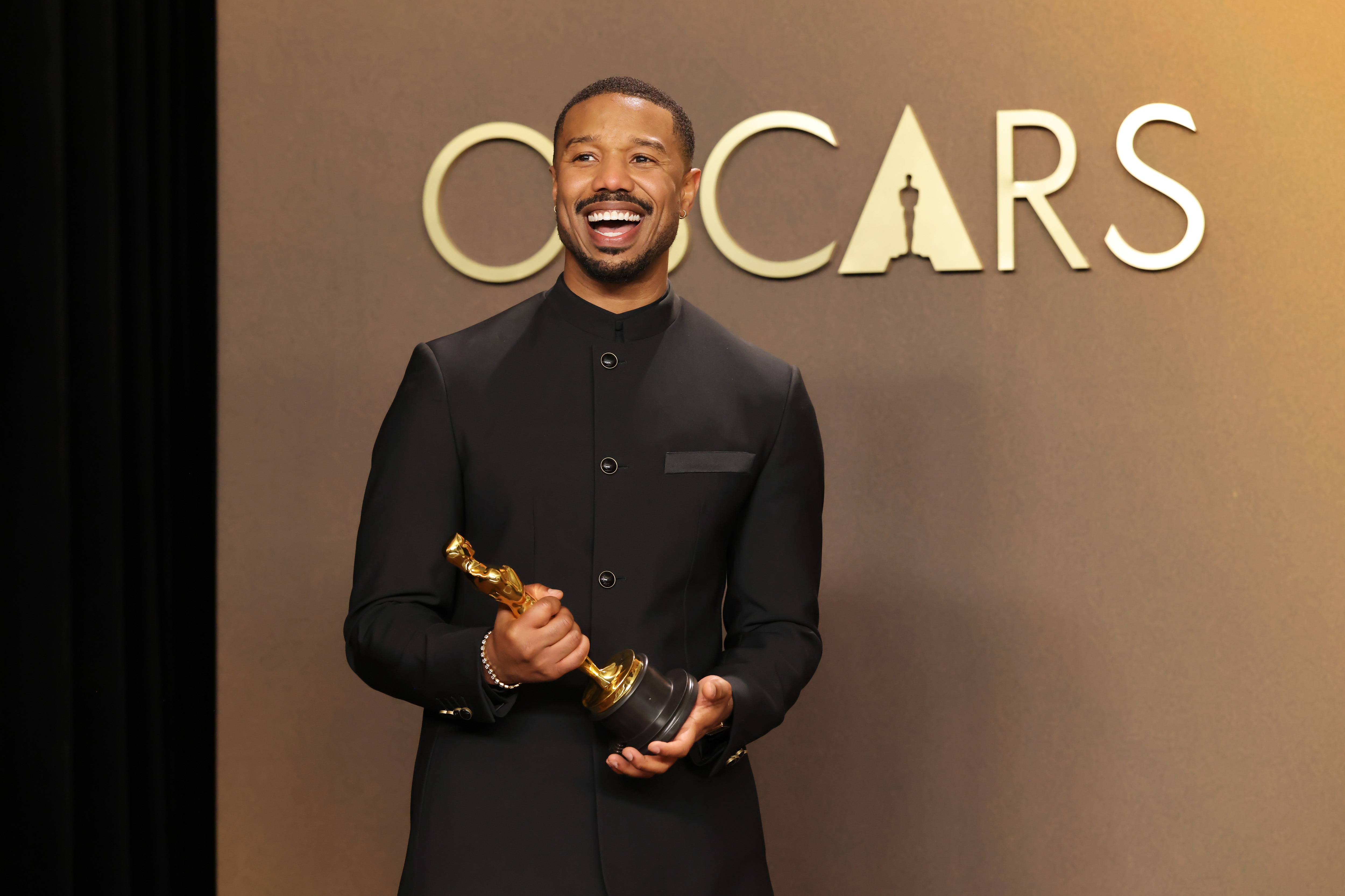 Michael B. Jordan celebrates Oscar win at In-N-Out, statue in one hand and burger in another