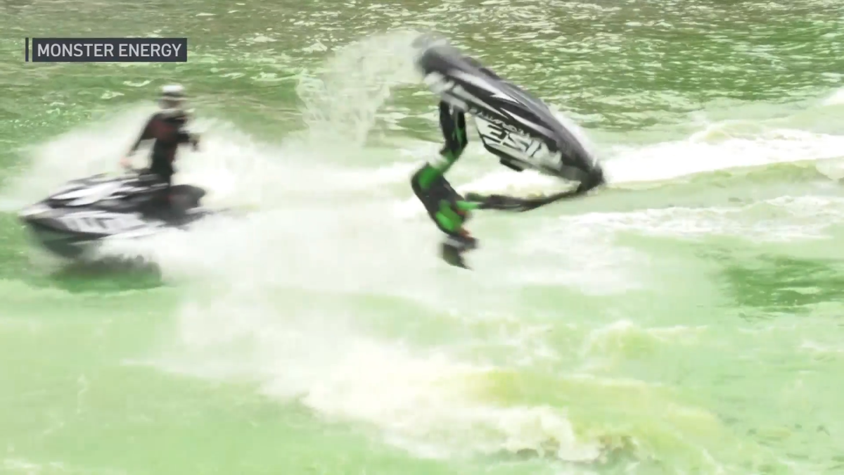 Watch Monster Energy's pro jet ski riders give a thrilling stunt show on the green Chicago River