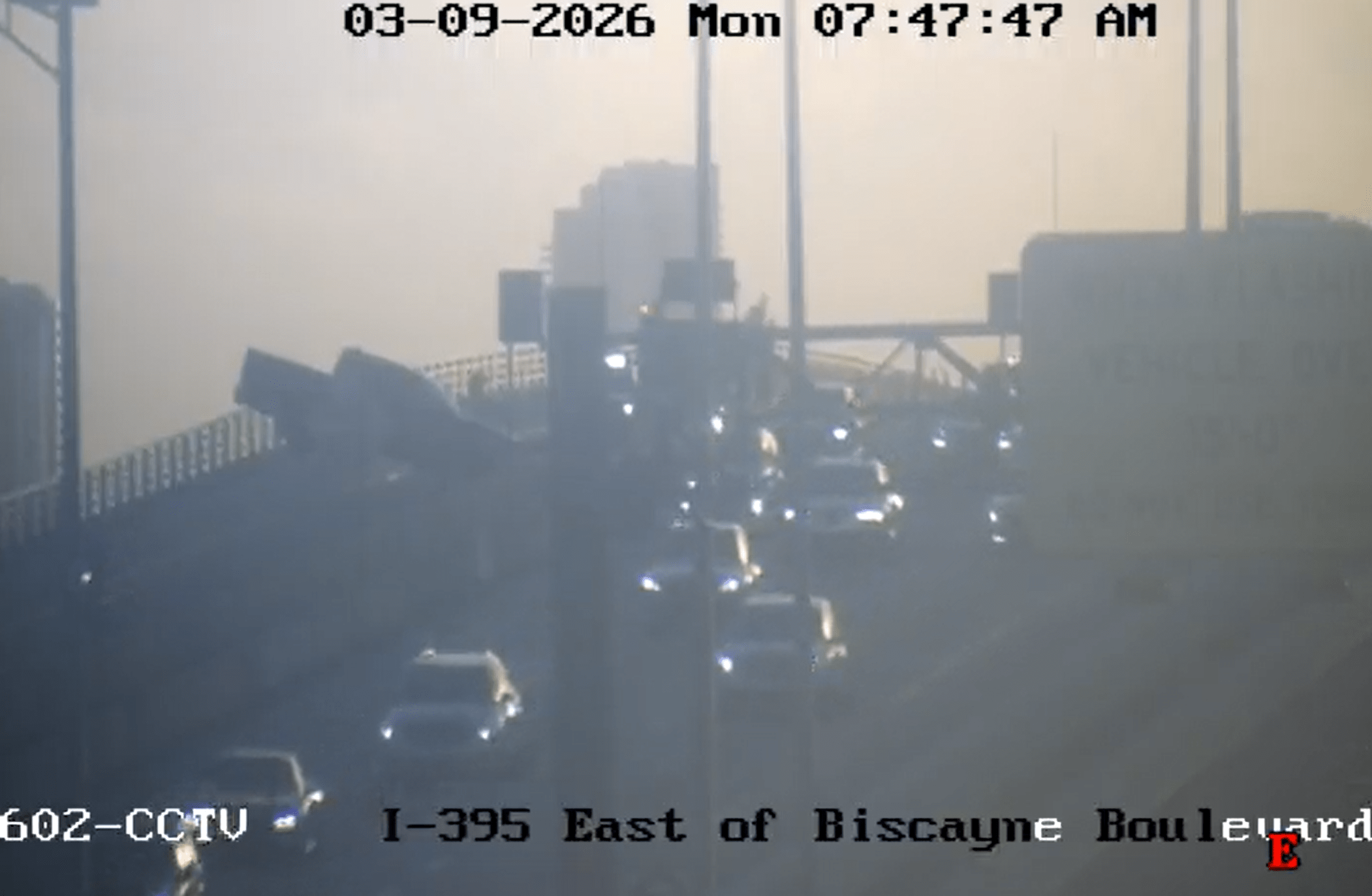 Pickup truck leans over edge of road after crash on MacArthur Causeway