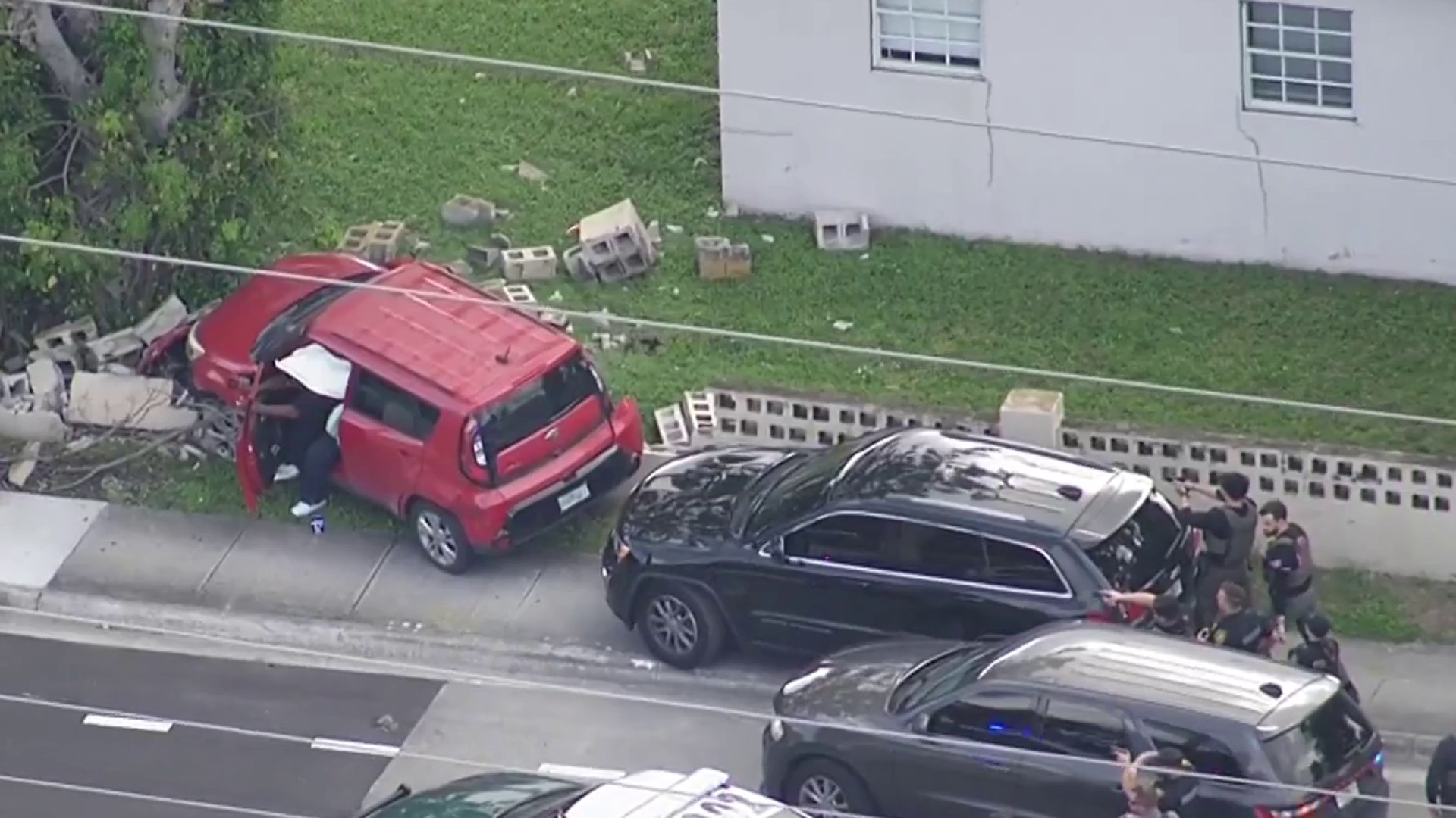 Bank robbery suspect in custody after police chase comes to crashing end in Broward