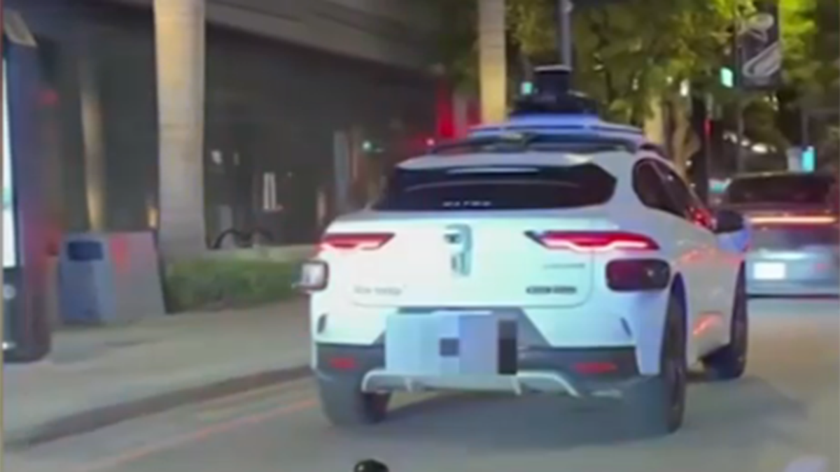Viral video appears to show Waymo stop in Miami traffic near police cruiser