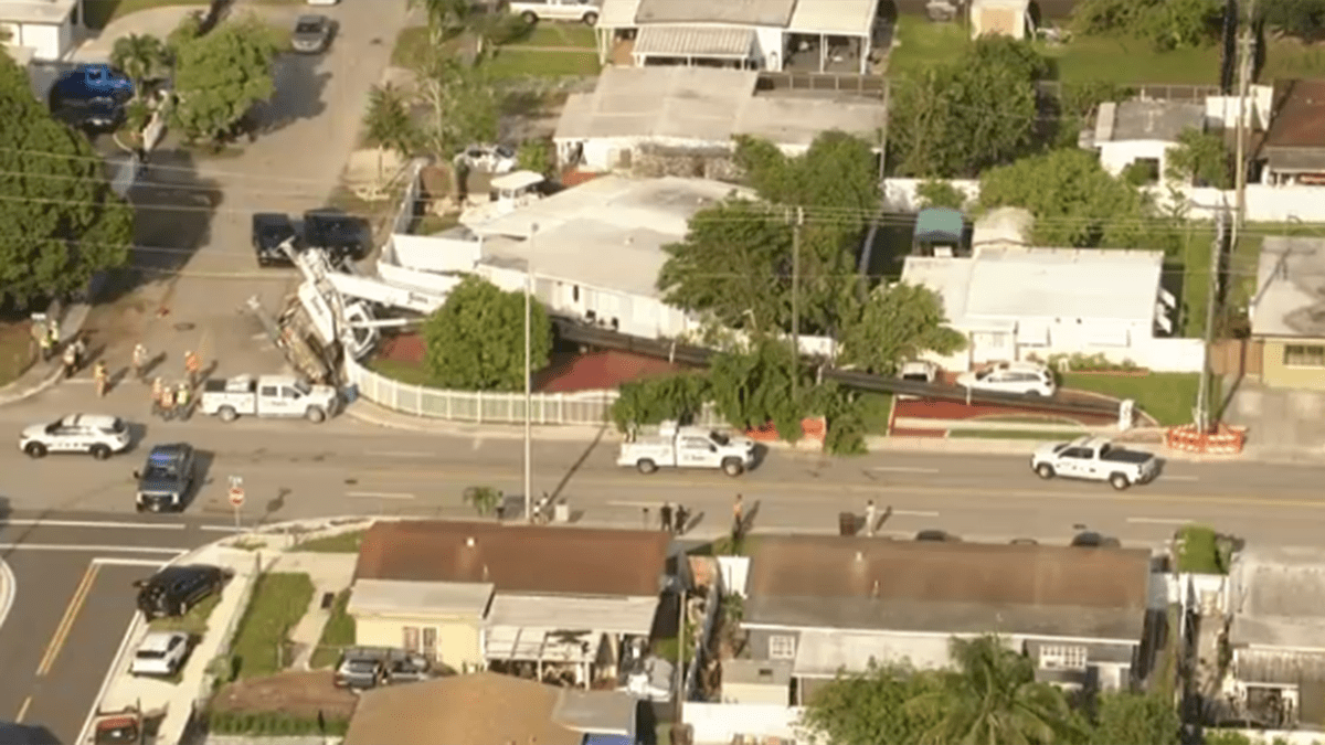 Crews respond after large crane collapses in Hialeah neighborhood