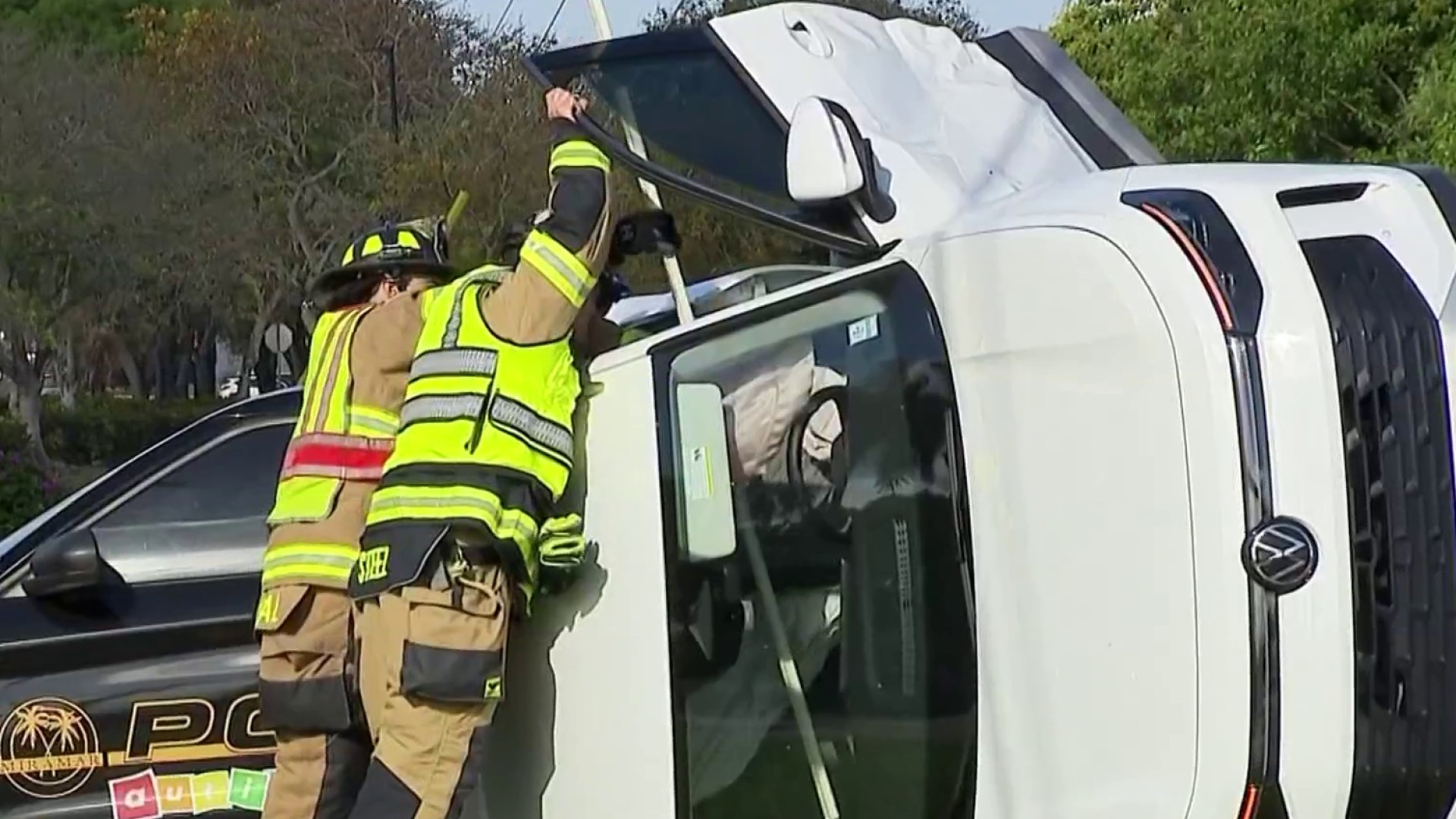 Car flips onto side after crash on Miramar Parkway